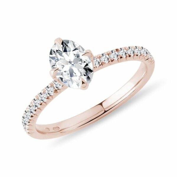 Prsten s oválným diamantem a brilianty v růžovém zlatě