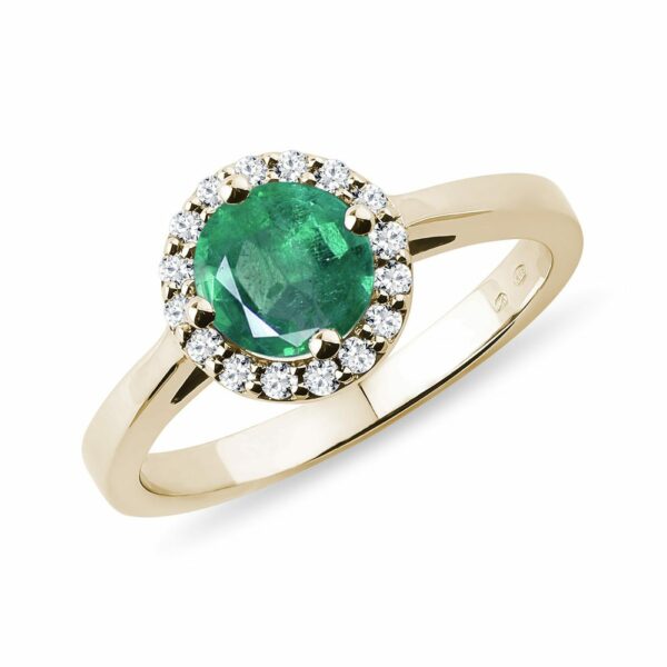 Smaragdový halo prsten s diamanty ve zlatě