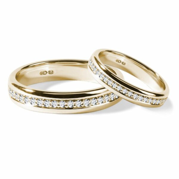 Sada snubních diamantových prstenů eternity ze žlutého zlata