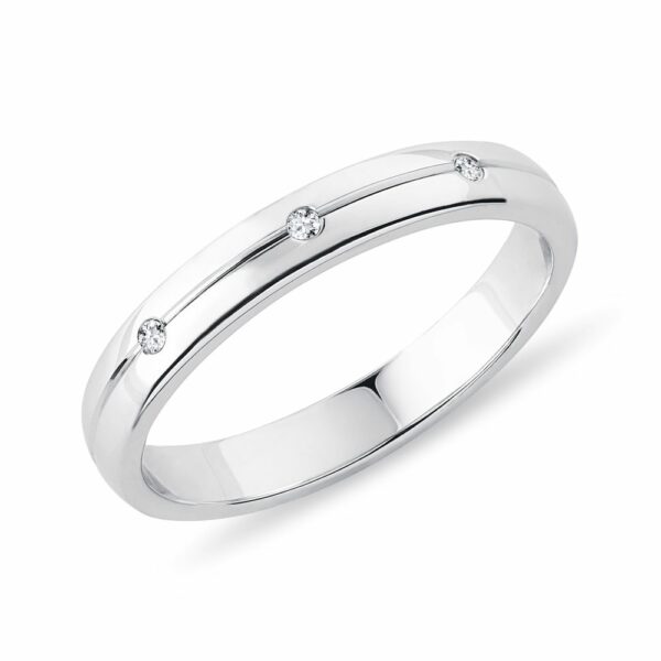 Dámský snubní prsten z bílého zlata s diamanty