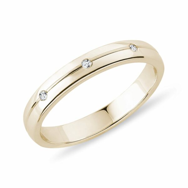Dámský snubní prsten ze žlutého zlata s diamanty