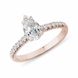 Prsten z růžového zlata s 0.7ct diamantem a brilianty